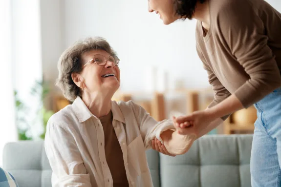 Happy patient and caregiver spending time together